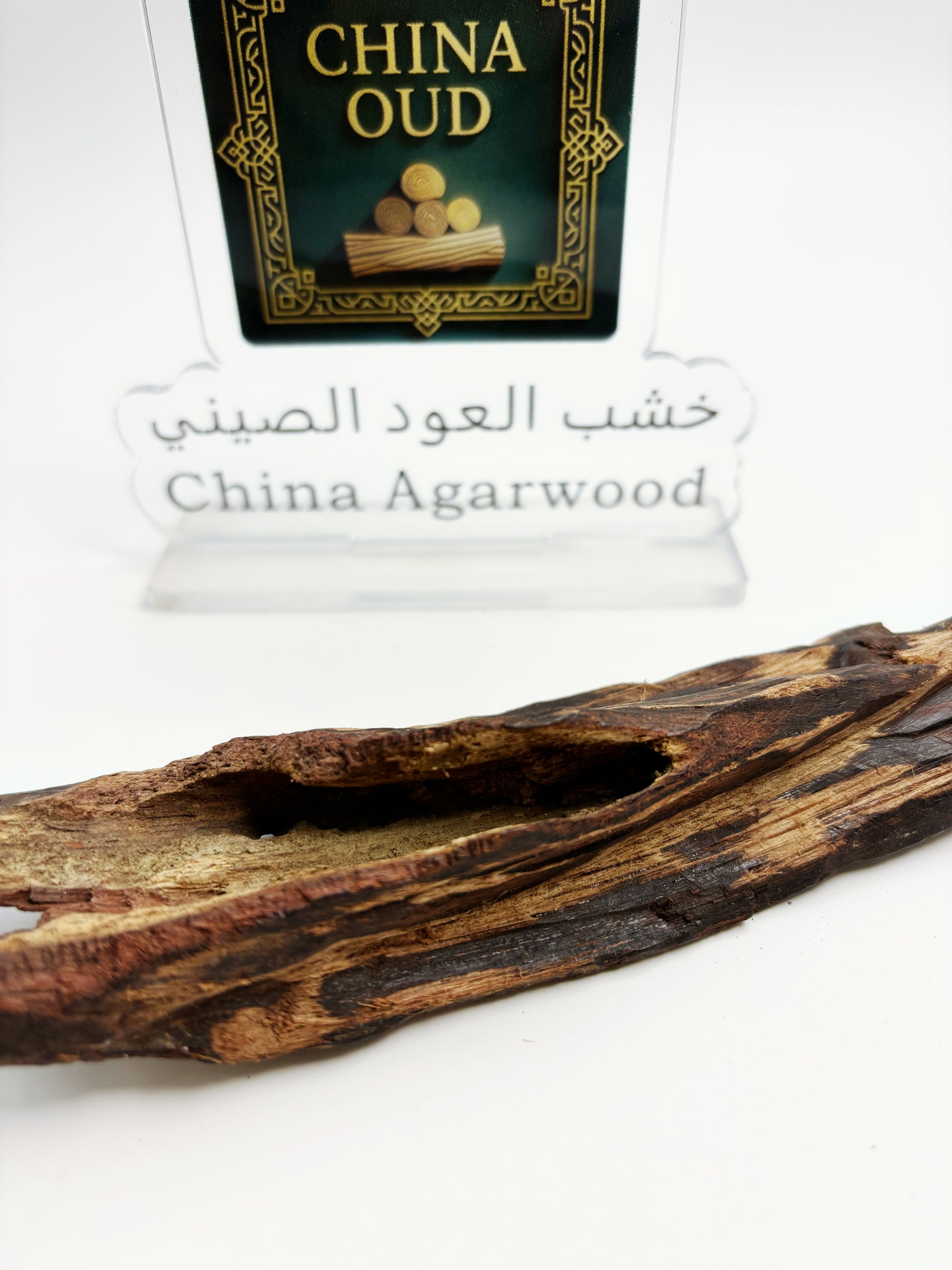 Close-up of premium big-leaf Hainan sandalwood showing robust natural oil veins